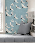 Blue Halcyon Crane Peel And Stick Wallpaper with cranes on blue background in room setting, 20.5 In by 18 Ft Roll