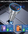 98W Usb C Car Charger Straight Up Crushes Fast Charging Needs With Four Ports, plugged into a car's cigarette lighter socket.
