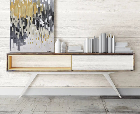 White shiplap peel and stick wallpaper, off white tones, removable DIY wall decor behind a modern console and abstract art