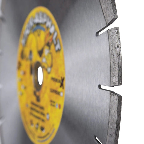 Close-up of Kick Asphalt 12 Inch Diamond Blade With Segmented Wedge Segments For Wet Or Dry Cutting Of Asphalt Green Concrete Masonry Block