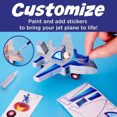 Person customizing Jet Plane Ace Wooden Model Kit for Kids 5 and Up Easy Build STEM Craft Set with glue and stickers