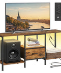Top Shelf TV Stand And Media Console Fit For Screens Up To 55 Inches Featuring Easy Access Storage Drawers And Open Shelving Rustic Brown Steel Frame For Chill Living Room Setup with TV, drawers, and speaker.