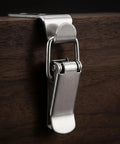 Image of 4 Pack 90 Degree Toggle Latches With 16 Stainless Screws for Tool Boxes Cabinets and Storage Chests shown on wood surface