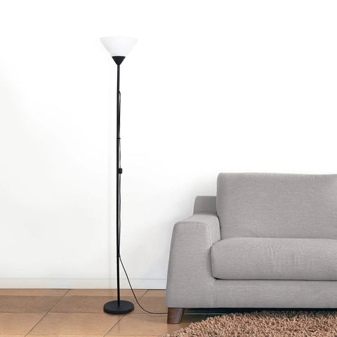1 Light Torchiere Floor Lamp In Black With A Sleek Stick Design, 70 Inches Tall, Metal Base And Frosted Shade next to sofa