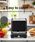 Versatile Contact Grill And Panini Press With 180 Degree Floating Hinge Plates For Steaks, Sausages, Quesadillas. Non-stick grill plate in kitchen.