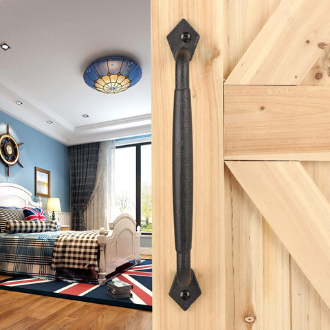 Rustic 12 Inch Barn Door Handle Heavy Duty Pull installed on a wooden sliding door in a cozy bedroom, matte black finish.