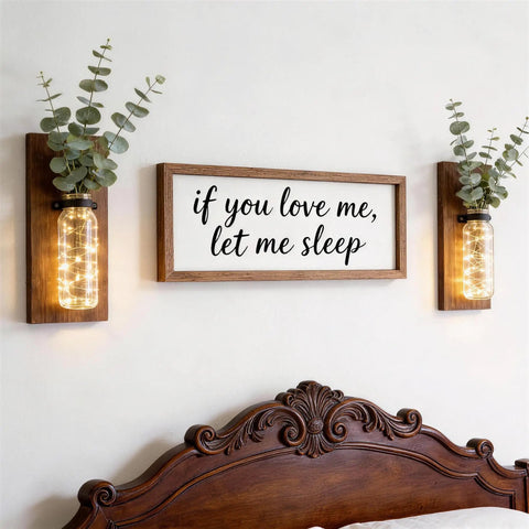 Game Changer Rustic Two Pack Wood Glass Wall Sconces Paired With Warm Twinkle Lights, featuring greenery and light display.
