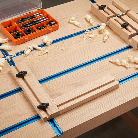 Woodworking setup with 10 Piece Super Grippy Black Wing Knobs With 1/4-20 Threads For T-Track Jigs and Feather Boards on a workbench.