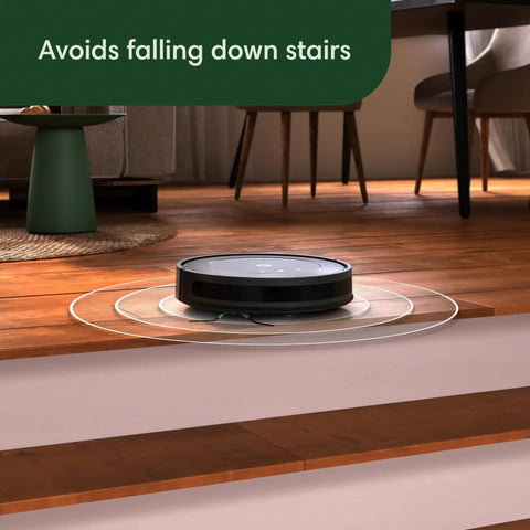 Robot Vacuum And Mop Combo With Powerful Suction And Smart Mapping For Multi Surface Floors In One Pass Easy To Use Self Charging Bagless Space Saving Design Cleans In Neat Rows And Edges Great For Pet Hair And Daily Messes on a step with anti-fall feature.