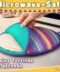 Person placing tortillas in a multicolor 12 inch tortilla warmer pouch, microwavable fabric insulated heat keeper next to microwave.