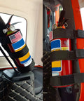 Badass Trail Tough Heavy Duty Black Nylon Fire Extinguisher Roll Bar Mount With Ultra Universal Hook Fastening Straps For Jeep Wrangler Off Road Rig Build holding a fire extinguisher securely.