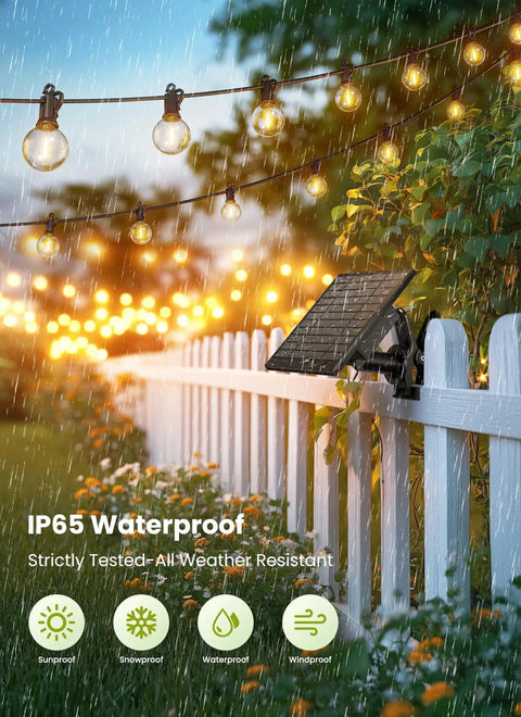 58 Foot Solar String Lights Outdoor With Remote Control, 26 LED Shatterproof Bulbs on a white fence in a rainy garden