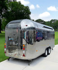 Lightweight Mobile Food Trailer With Full Plumbing And Electrical Wiring Solid Rig For Your Downtown Block Party Or Street Food Hustle Ready To Roll Smooth Today, silver exterior with rear view.