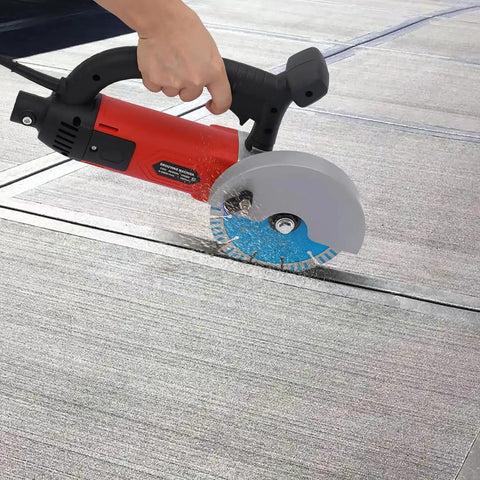 Super Tough 3000W Corded Electric Concrete Saw With Integrated Water Pump And Blazing 7000 RPM Motor cutting through concrete.