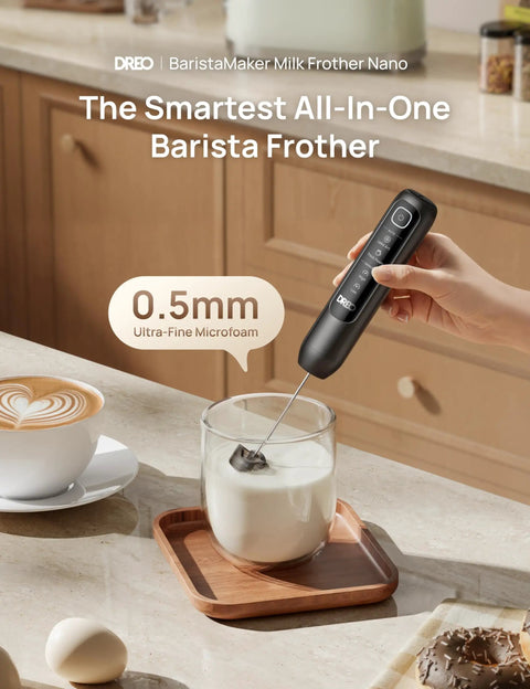 Handheld Milk Frother For Coffee Drinks Creates Silky Latte Art Foam In Minutes, black electric mixer in glass with milk.