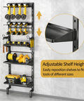 Five Tier Vertical Wall Mount Tool Storage Rack For Garage Heavy Duty Metal Organizer With Eight Drill Holder Slots Adjustable Shelves Side Hooks Space Saving Workshop Utility shown in black steel installed on a wall with tools.