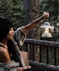 Person holding Outpost Lantern With Helix Edison Rope, Vintage White Outdoor Light For Camping, Patio And Backyard