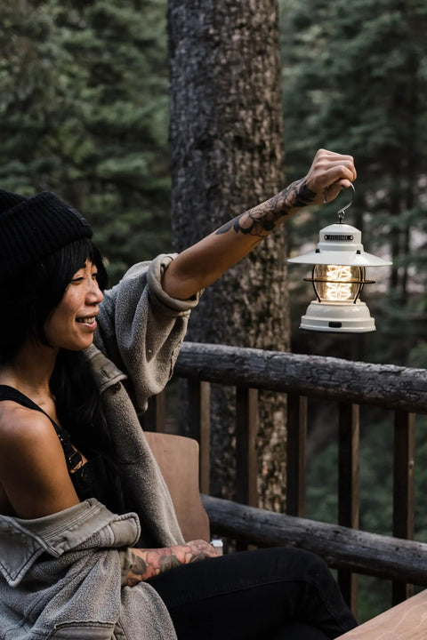 Person holding Outpost Lantern With Helix Edison Rope, Vintage White Outdoor Light For Camping, Patio And Backyard