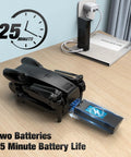 Foldable 1080P HD Camera Drone showing battery slot for two batteries, ideal for beginners and kids adults, charging setup on table.
