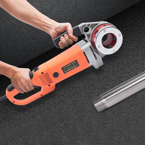 Heavy Duty Electric Pipe Threader Machine With Copper Motor And Portable Handheld Design For No Sweat 110V Threading Operations held in hand