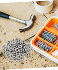 200 Piece Stainless Steel Hex Nuts Heavy Duty Hardware Fasteners for Repair Assembly and Fabrication Jobs on a workbench.