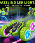 2.4GHz Off Road RC Car with Dual Sided 360 Degree Roll, green color, LED headlights, high speed stunt racer on neon lit track