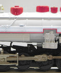 Side view of Winter Wonderland LionChief Steam Locomotive Engine for O Gauge, showing wheels and red details for model railroading