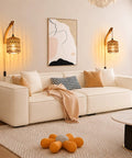 EHFMGYB Rattan Wall Sconces Set of Two Plug in, Boho Wall Lamp with 9.84FT Plug in Cord above a cream sofa in living room.