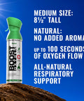 Boost Oxygen Natural 5L Canister Six Pack for Respiratory Support Altitude beside rock against blue sky