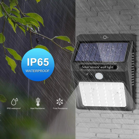 Six Pack Solar Outdoor Lights With Three Modes Dim Long Light Mode Bright Sensor Mode And Motion Detection For Security Waterproof Outdoor Lighting For Garden Fence Patio And Garage installed on brick wall in rain.