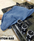 Blue Cotton Shop Towels Pack Of 150 12x14 Inches Absorbent Cleaning Rags used on a stove surface for streak free cleaning
