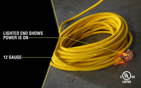 Yellow Jacket Heavy Duty Extension Cord For Outdoor Tools And Equipment With Lighted End And Weather Resistant SJTW Jacket 12 Gauge 50 Foot Durable Power Cable gathered on a floor.