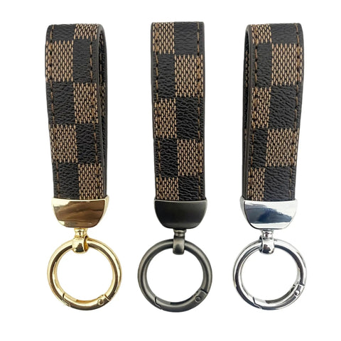 Top Shelf Leather Keychain With Secure Anti Lost D Ring And Heavy Duty Zinc Alloy Clip, smooth checkered brown design, three color options.