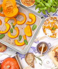 Stainless Steel Baking Sheet Set With Rack For Oven And Dishwasher Safe 19.6 Inch Two Pans And Two Racks featuring roasted pumpkin slices.