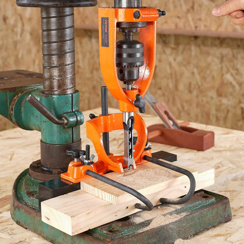 Heavy Duty Drill Press Mortising Attachment With Square Hole Chisel Set And Five Precision Bushings For Woodworkers, close-up view on wood.