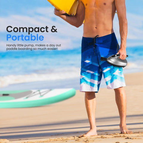 Man holding Electric Inflatable Paddle Board Pump With 20 PSI High Pressure Auto Shut Off 12V Car Connector on beach