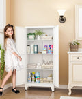 Child standing beside heavy duty white metal pantry cabinet with 2 doors and 3 adjustable shelves, bathroom setting