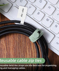 90 Piece Nylon Cable Labels And Cord Ties Set on desk with keyboard, showing cable tie securing cables, label marked 'data cable'.
