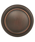 Traditional Round Cabinet Knob In Oil Rubbed Bronze Finish With Subtle Copper Highlights Adds Warm Elegance To Drawers Or Furniture - Top view