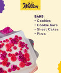 Extra Large 11 X 15 Inch Aluminum Baking Sheet Pan With 2 Inch Deep Sides and decorated cake with pink frosting flowers on white surface