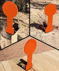 Three Eighths AR500 6 Inch Classic Popper Steel Target auto reset orange for pistols and rifles in outdoor setup.