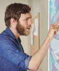 Man examining World History Timeline Poster For Classrooms Ancient Civilizations Comparison Chart With Blue Map 17 By 77 Inches Unframed