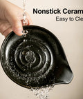 Nonstick porcelain spoon rest and drip tray for multiple utensils on the stovetop, black farmhouse kitchen decor.
