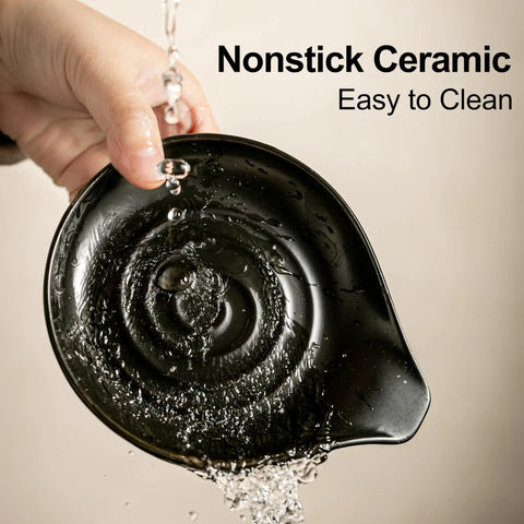 Nonstick porcelain spoon rest and drip tray for multiple utensils on the stovetop, black farmhouse kitchen decor.