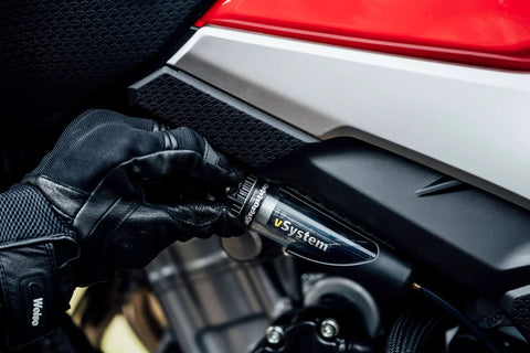 Vsystem Automatic Motorcycle Chain Lubrication System Easy Fit being installed on a motorcycle for smooth operation.