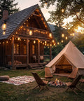 30Ft S14 Patio String Lights With 11 Clear LED Bulbs Plus 1 Spare, illuminating a rustic cabin and tent at sunset