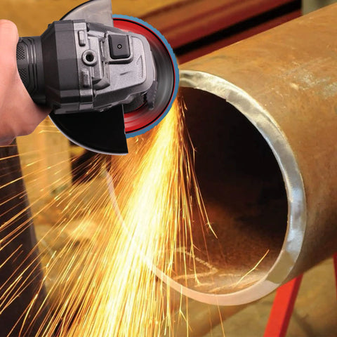 4 1/2 x 7/8 in flap disc on an angle grinder grinding stainless steel pipe with sparks