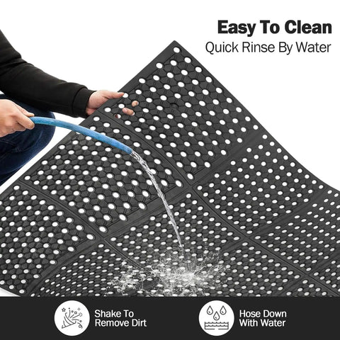 Person hosing down Anti Fatigue Drainage Rubber Mat For Wet Areas Non Slip Commercial Kitchen Floor Mat With Holes Rugged Natural Rubber Easy Clean Heavy Duty Black Pro Grade