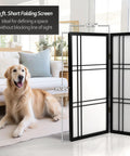3 Ft Black Double Cross Shoji Screen 3 Panel Folding Room Divider With Rice Paper Panels And Spruce Wood Frame Space Saver Lightweight Privacy For Small Spaces Easy To Move And Store next to a golden retriever in a living room setting