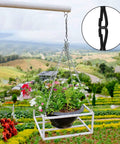 Hanging flowers on a chain with a black 12 Pack Swivel S Hooks For Wind Spinners Stainless Steel Rustproof Outdoor Garden Hardware.